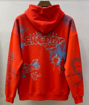 Pull rouge graffiti